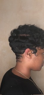Sculpted black pin curls, back view