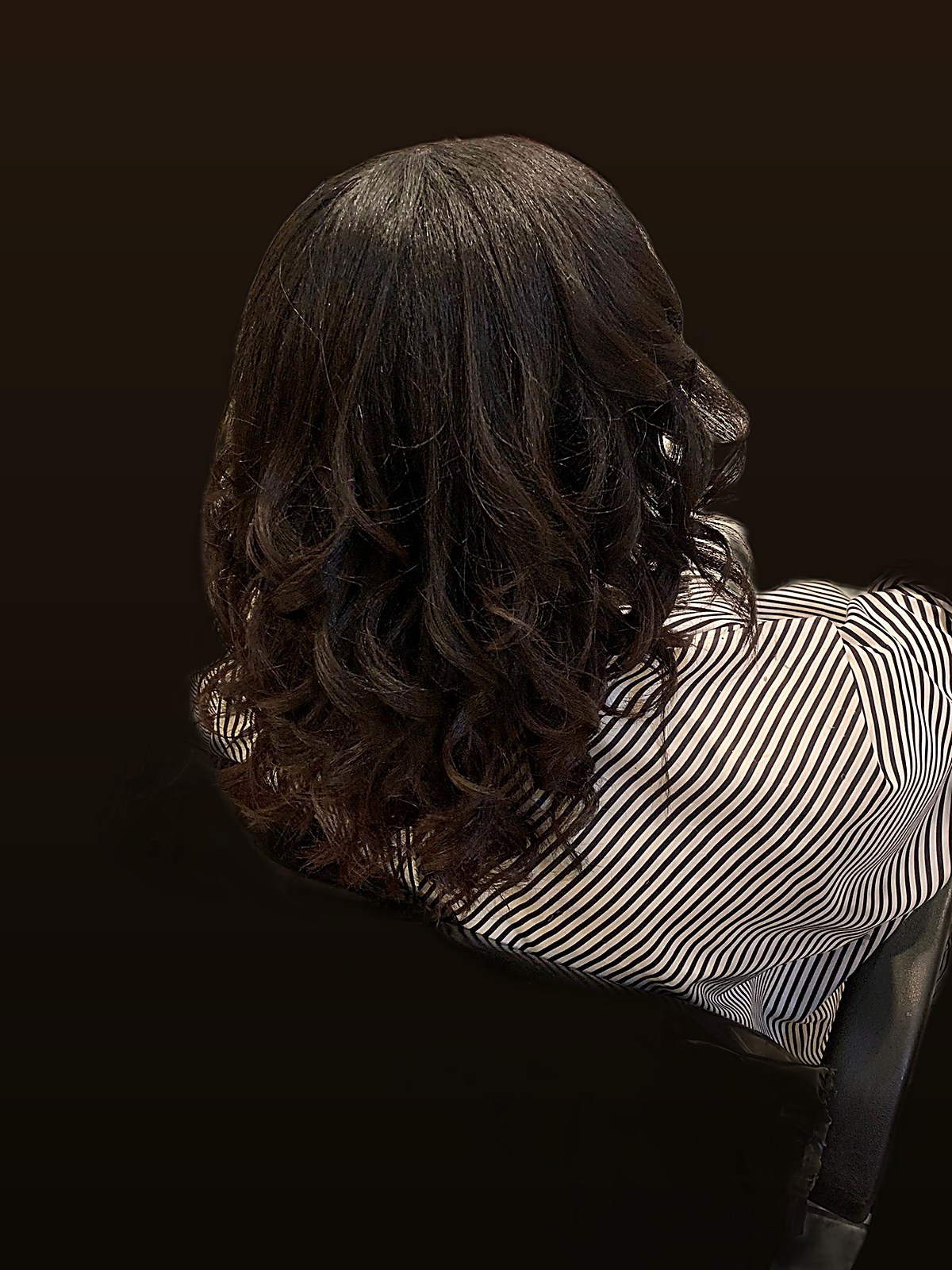Curled sew-in install, back view
